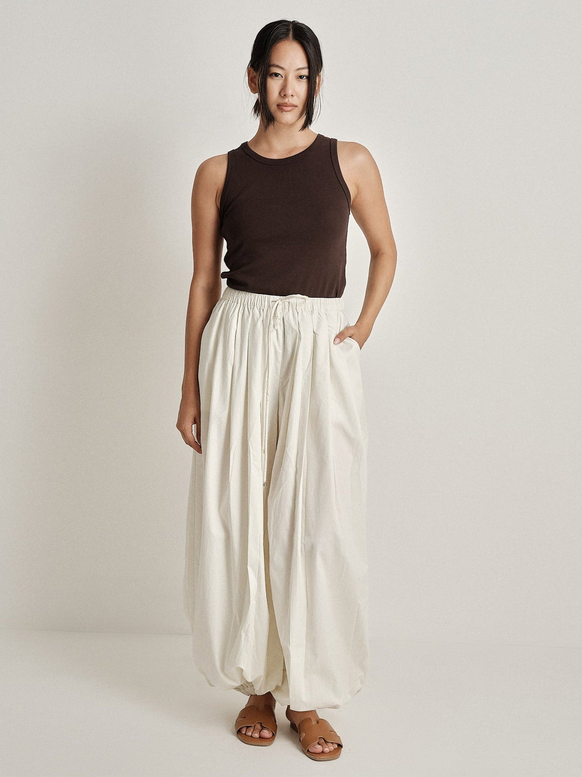 Pantalone plissé a gamba ampia