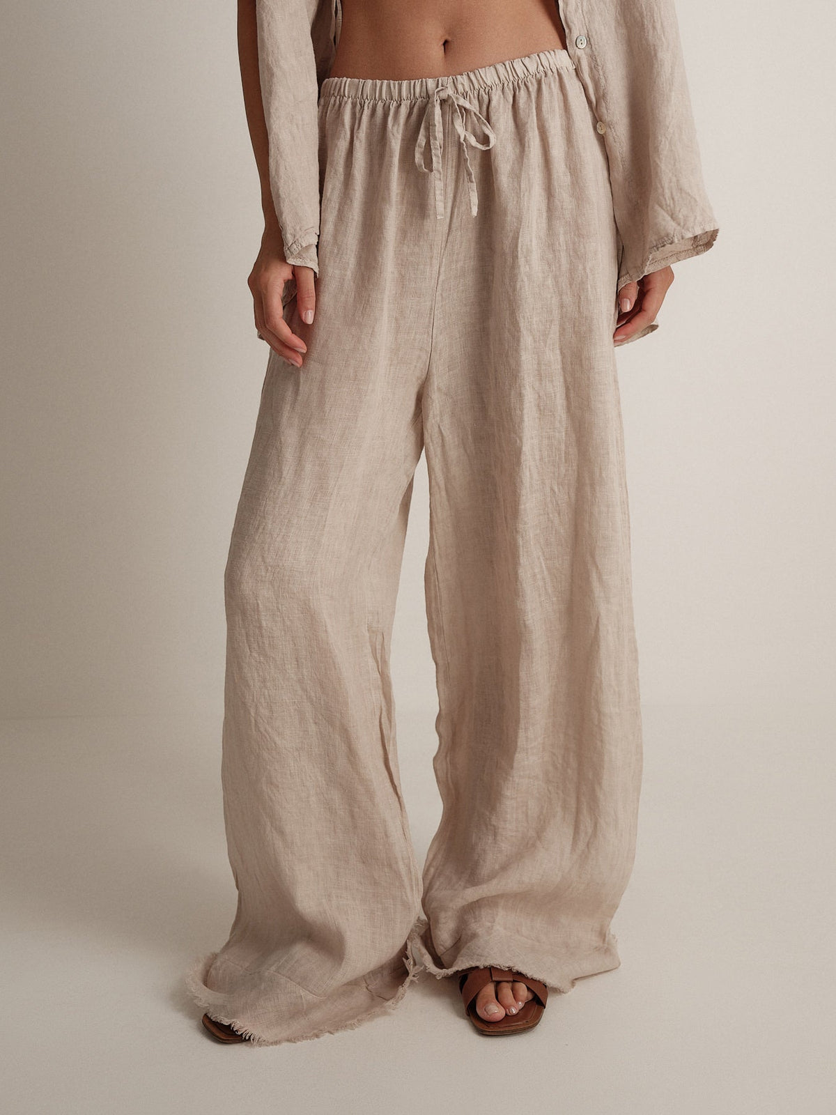 Pantalone in puro lino sfrangiato