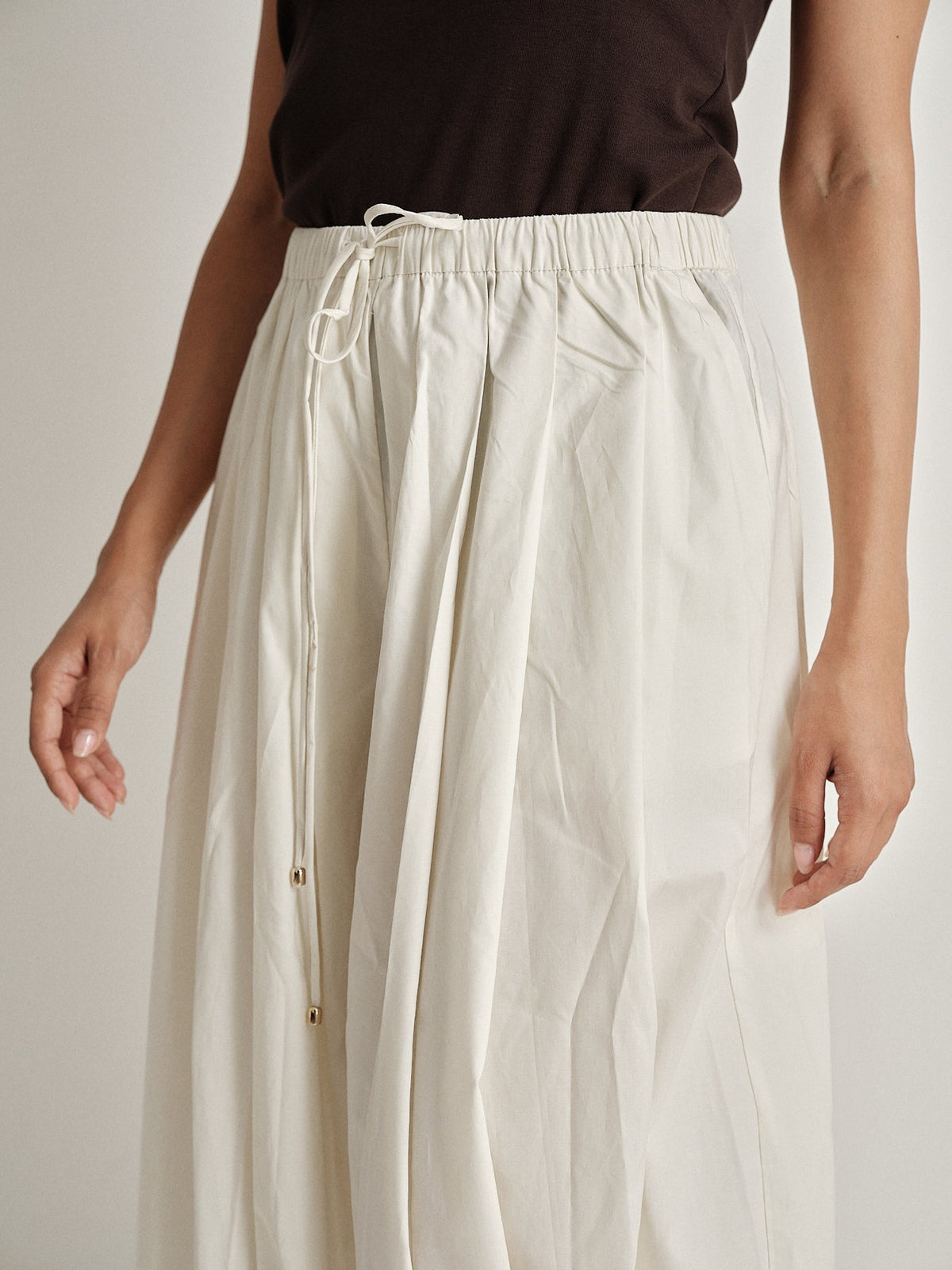 Pantalone plissé a gamba ampia
