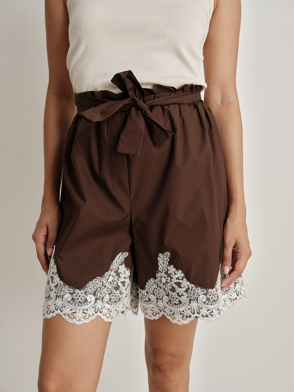 Short cuivre con pizzo